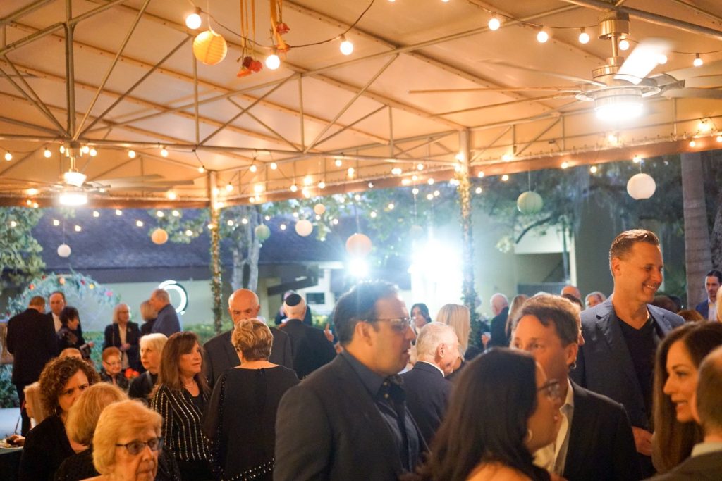 Guests at an evening event at Temple Sinai